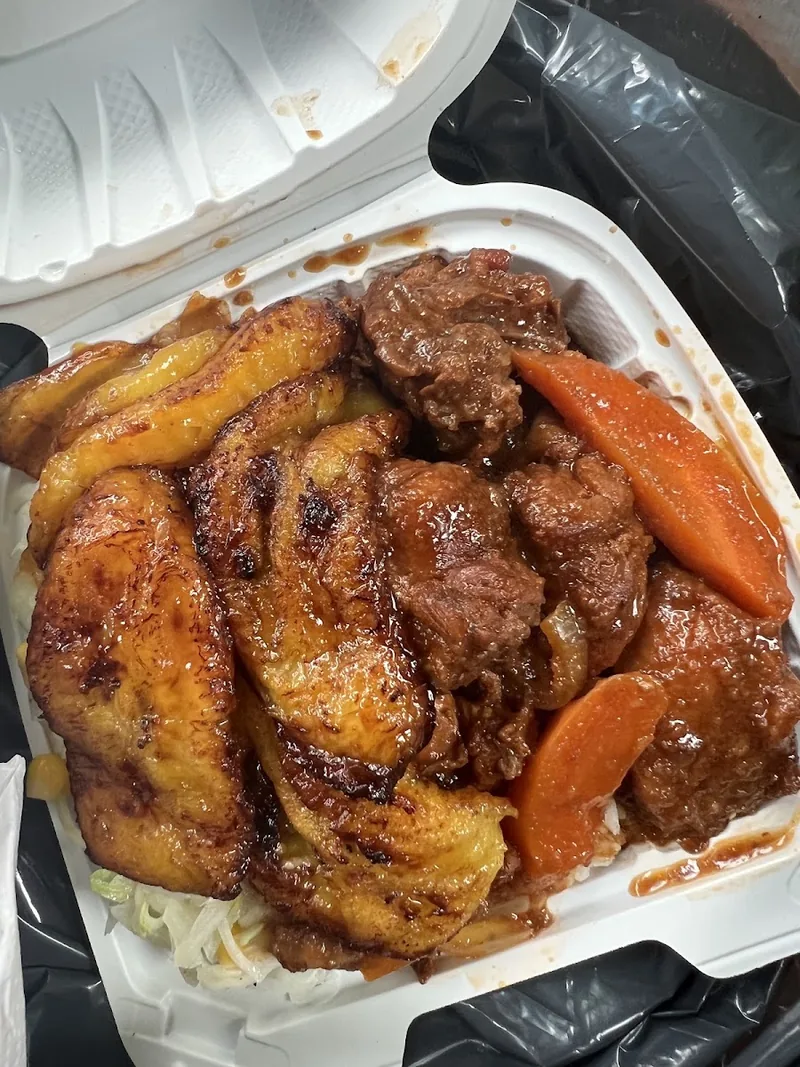 Stop N Go Tropical Grill, caribbean kitchen at 1668 Weston Road in Etobicoke, Toronto